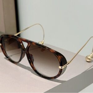 Stylish Tortoise Shell Sunglasses with Gold Details